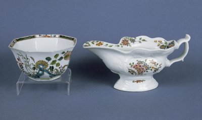 Worcester shaped oval sauce boat and octagonal bowl decorated in enamels by English School